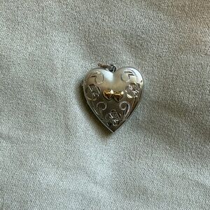 Heart-Shaped Silver Locket Pendant with Gold Accent